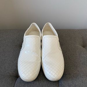Hugo Boss Orange label.  No laces white sneaker.